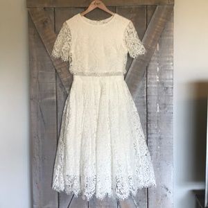 White unfinished lace dress